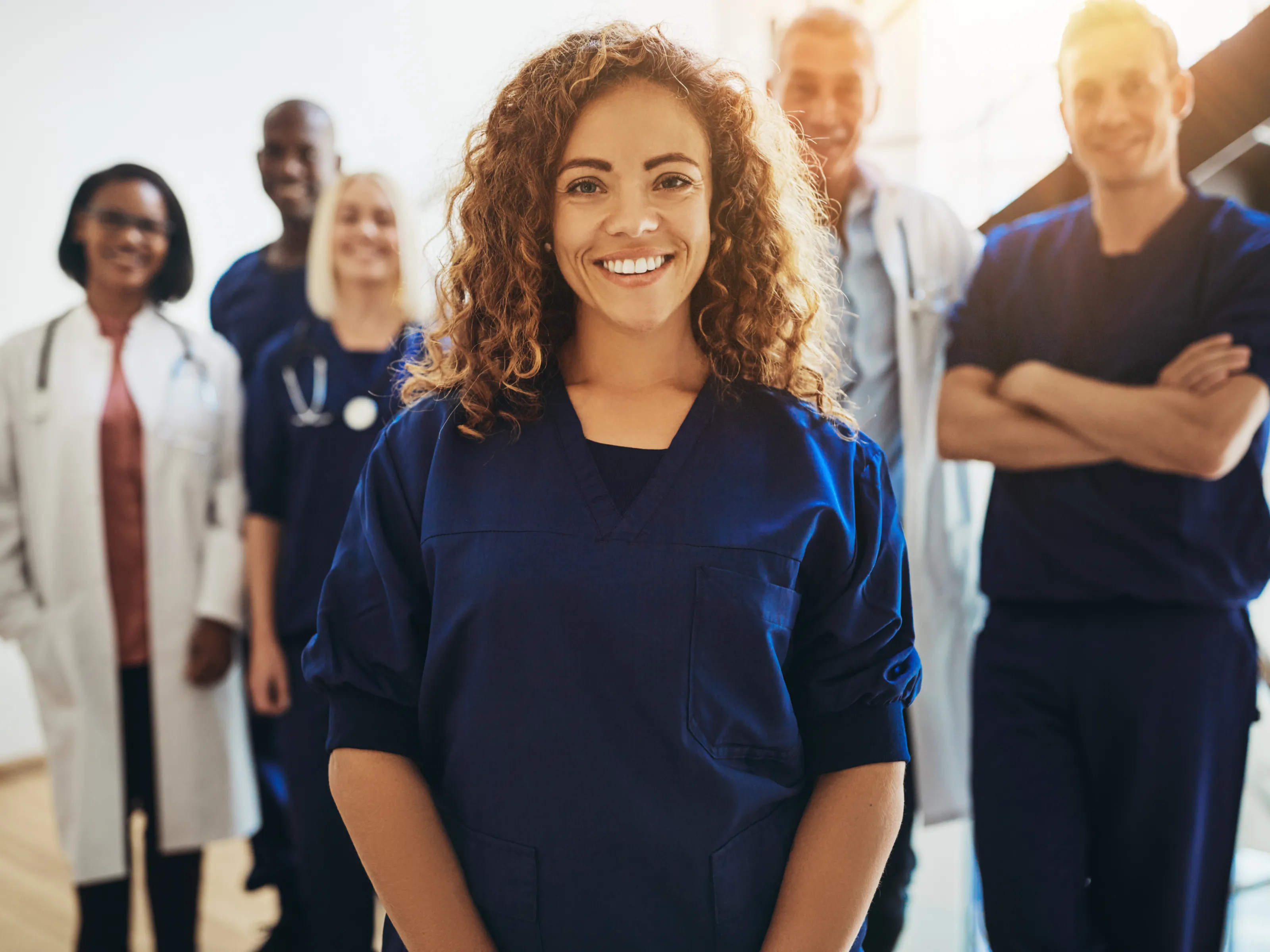 Healthcare professionals smiling for the camera