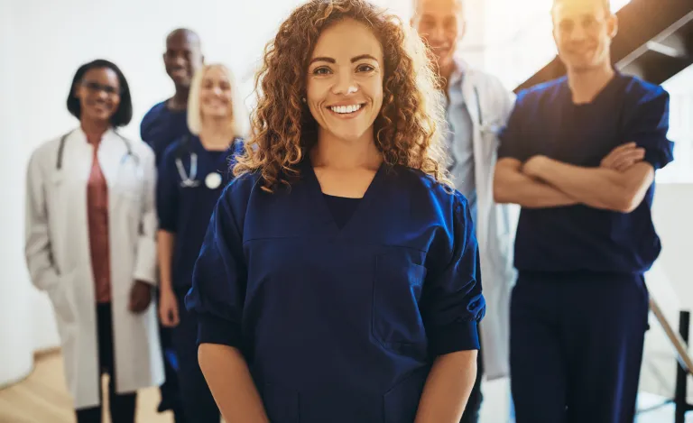 Healthcare professionals smiling for the camera