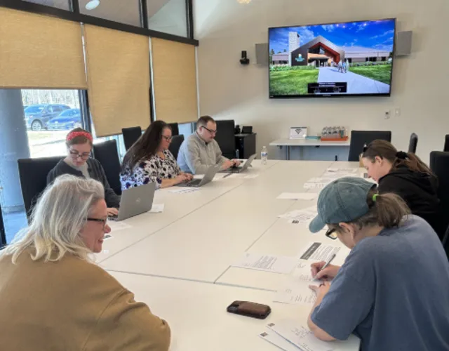 Boundless employees writing letters