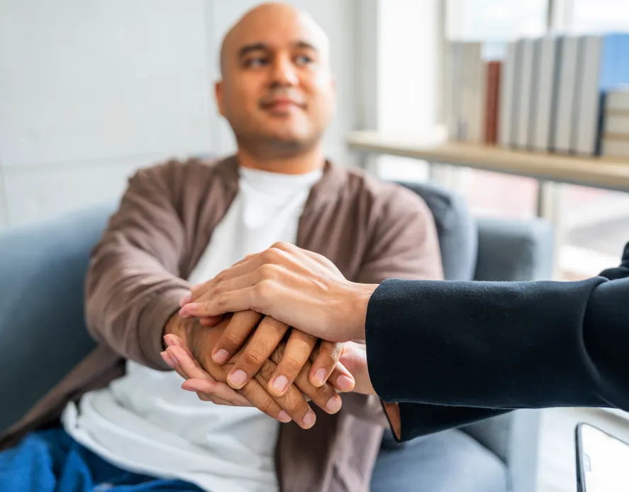 Man shaking hands with psychiatrist
