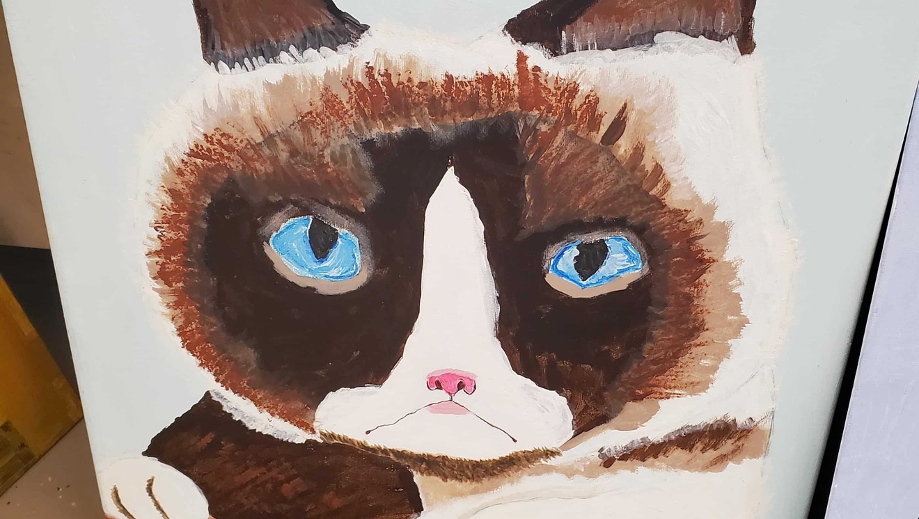 Painting of a siamese cat.