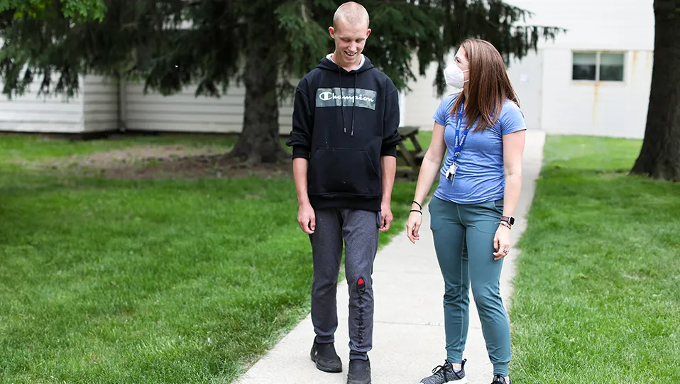 BT and a client walking outside