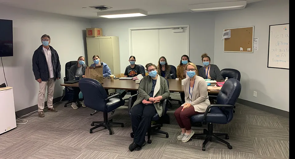 the Boundless speech and language team at a conference table