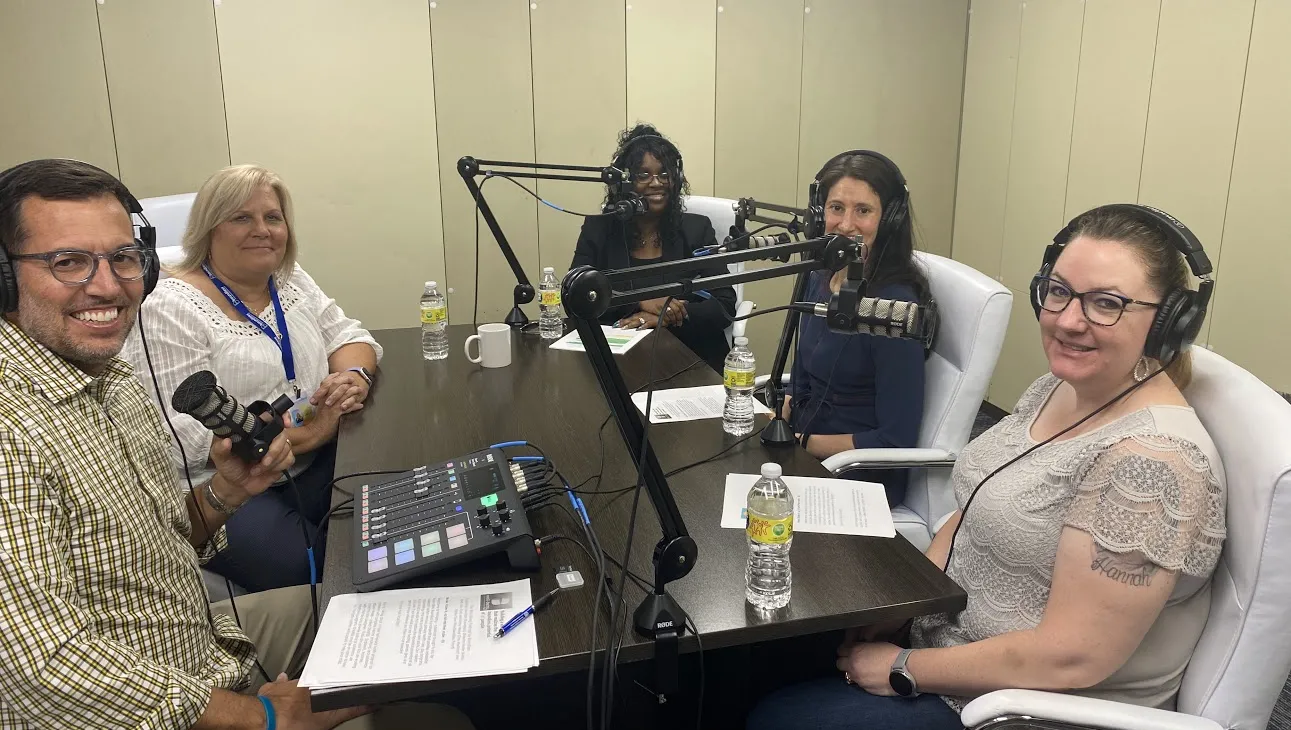 Participants recording a podcast