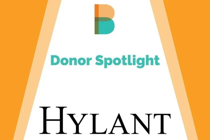 Hylant's logo in a stylized spotlight