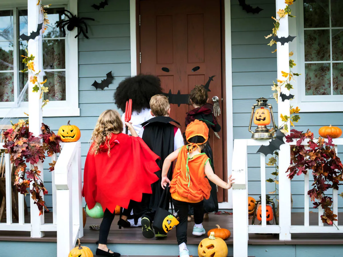 Stock photo of kids trick or treating