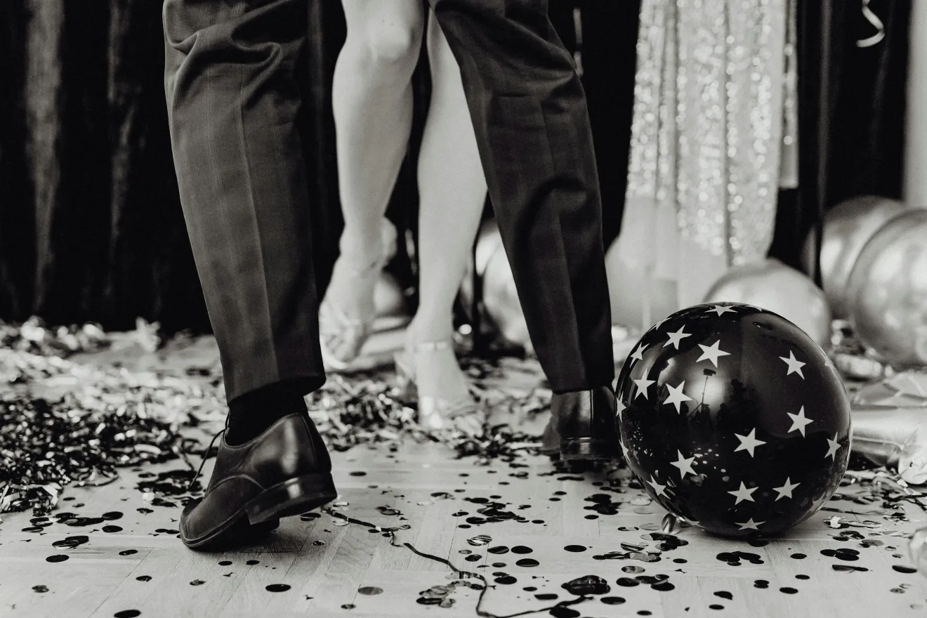 two people dancing near a balloon