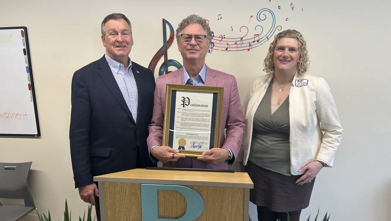 Dr. Patrick Maynard, PhD, poses with Independence, OH officials at the opening of the Sister Mary Charles Center