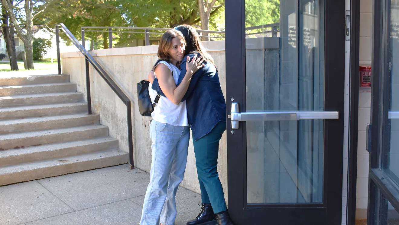 Two people hugging on the Worthington Boundless Campus
