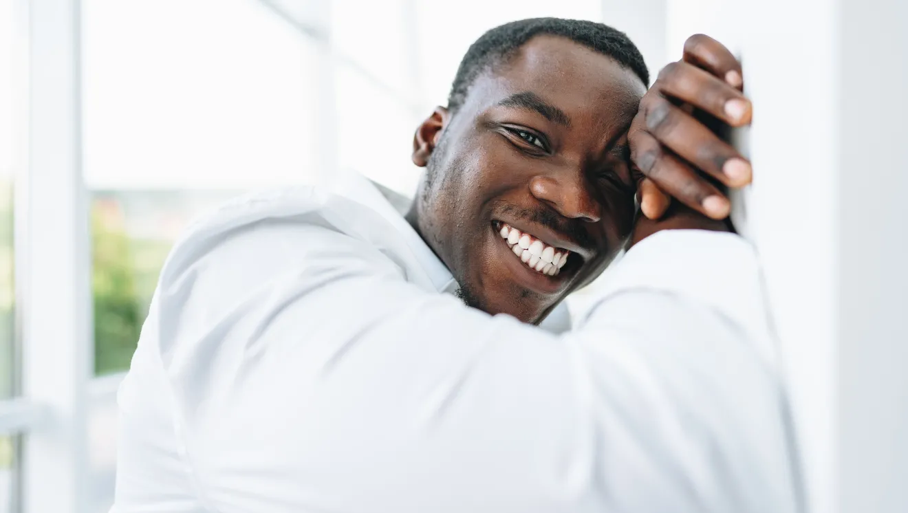 autistic man smiling