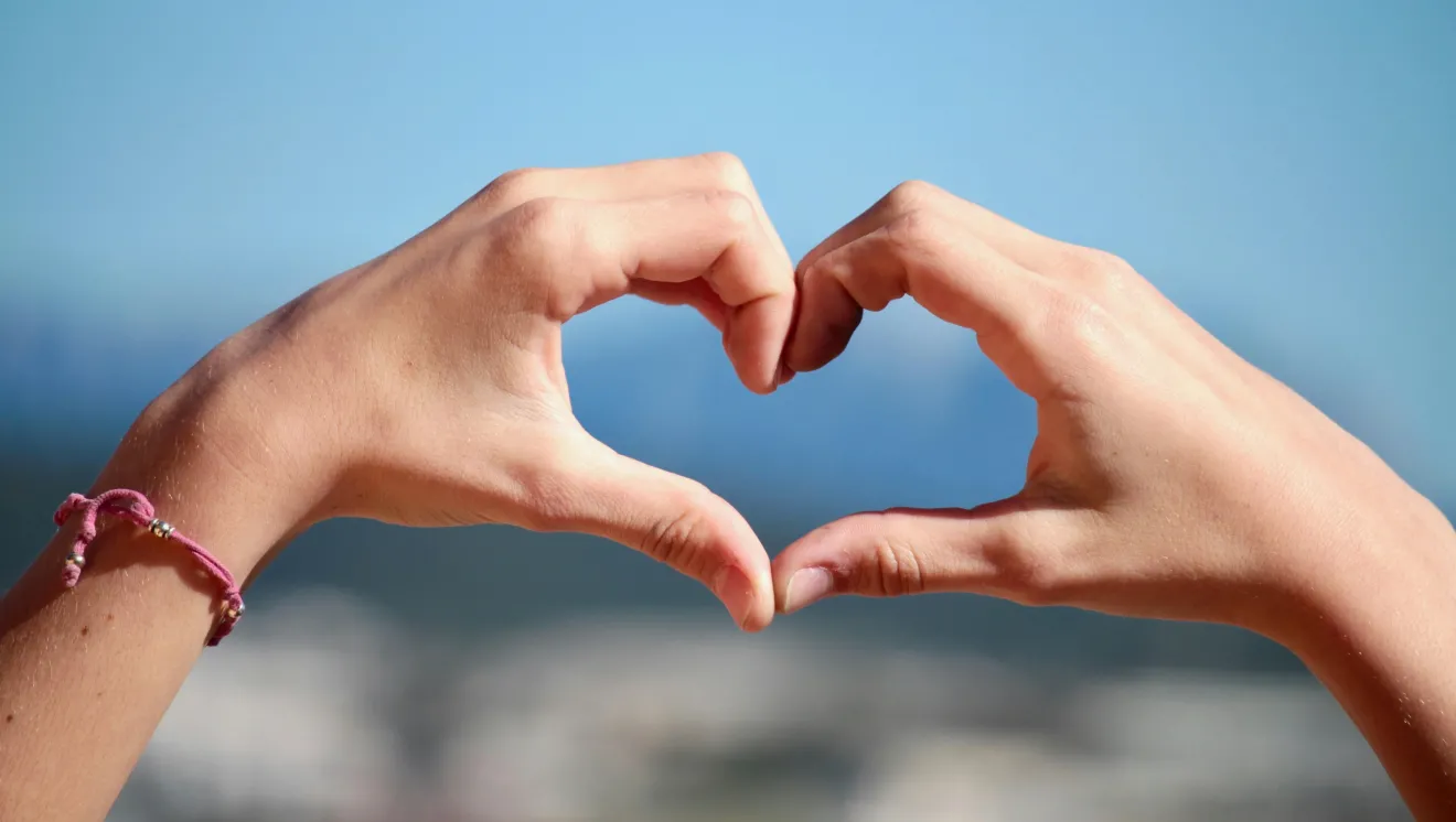 fingers making a heart shape