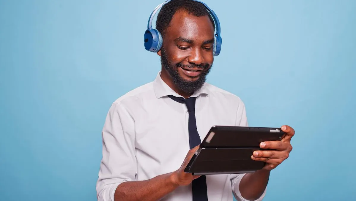 adult with noise cancelling headphones