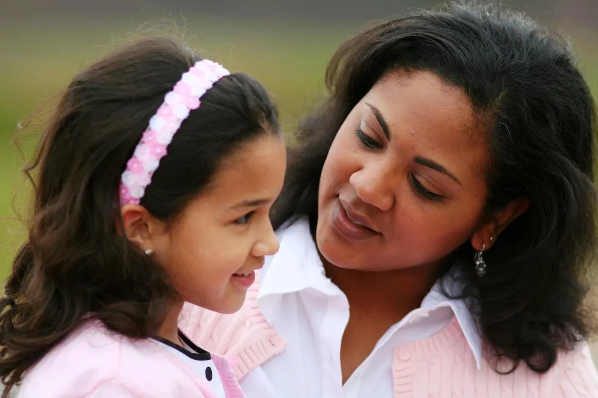 adult talking to a child